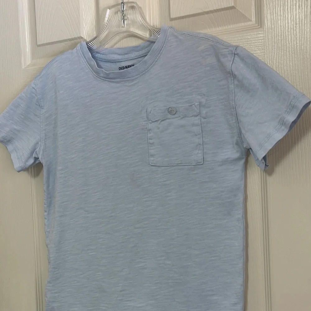 Old Navy baby blue size 10 - 12 short sleeve tee. Great condition!